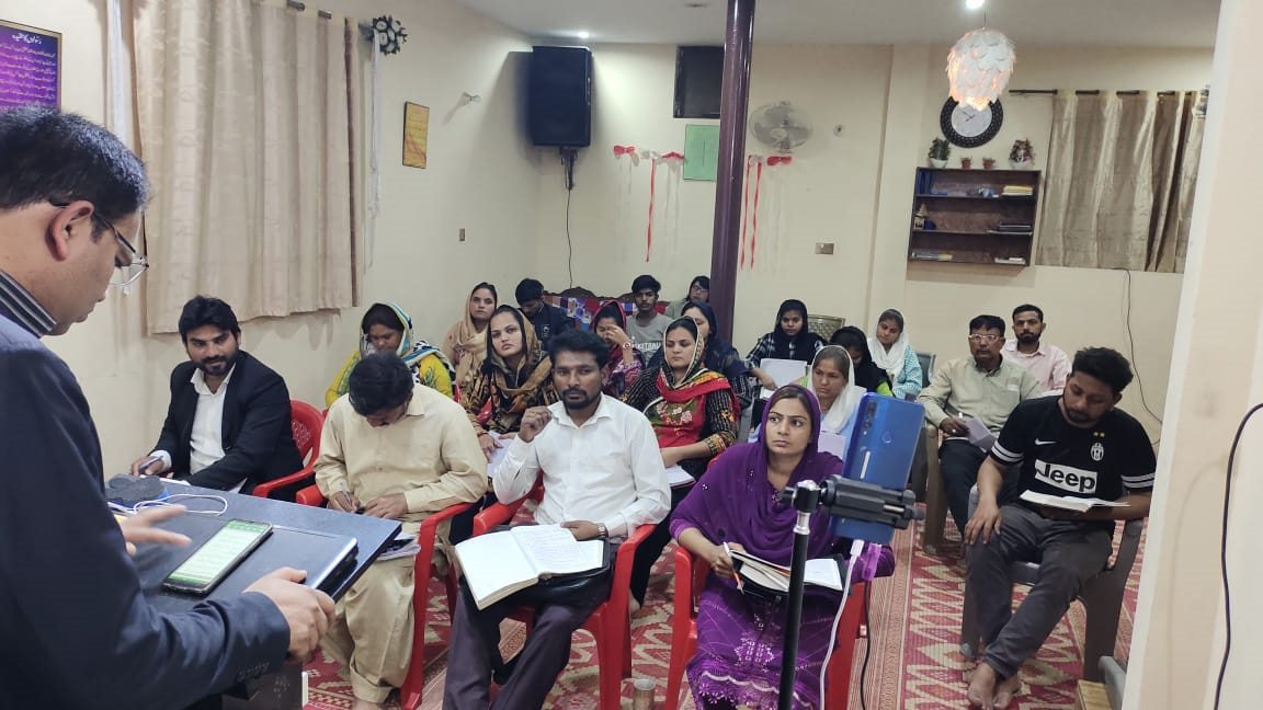 A Bible teaching group gathered in a room