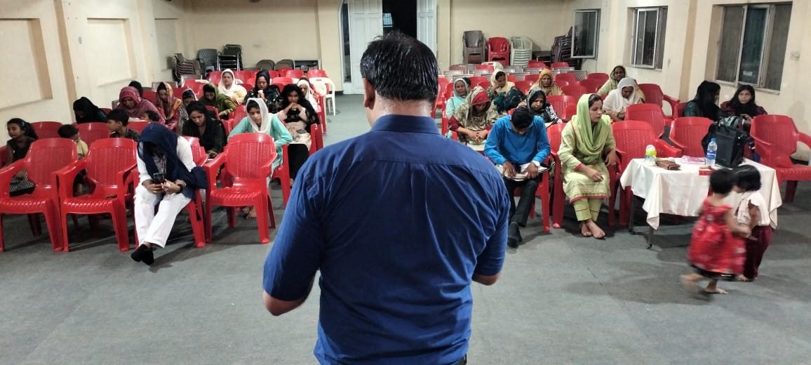 An audience gathered for a ministry seminar
