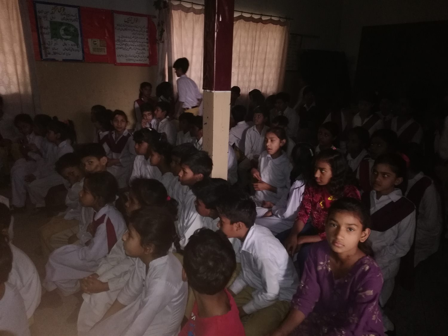 Children watching a Bible lesson together