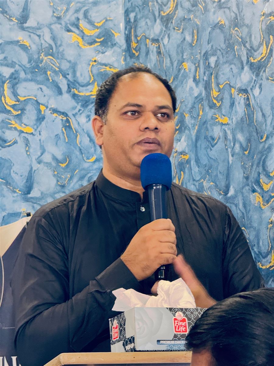 Church leader speaking during a service