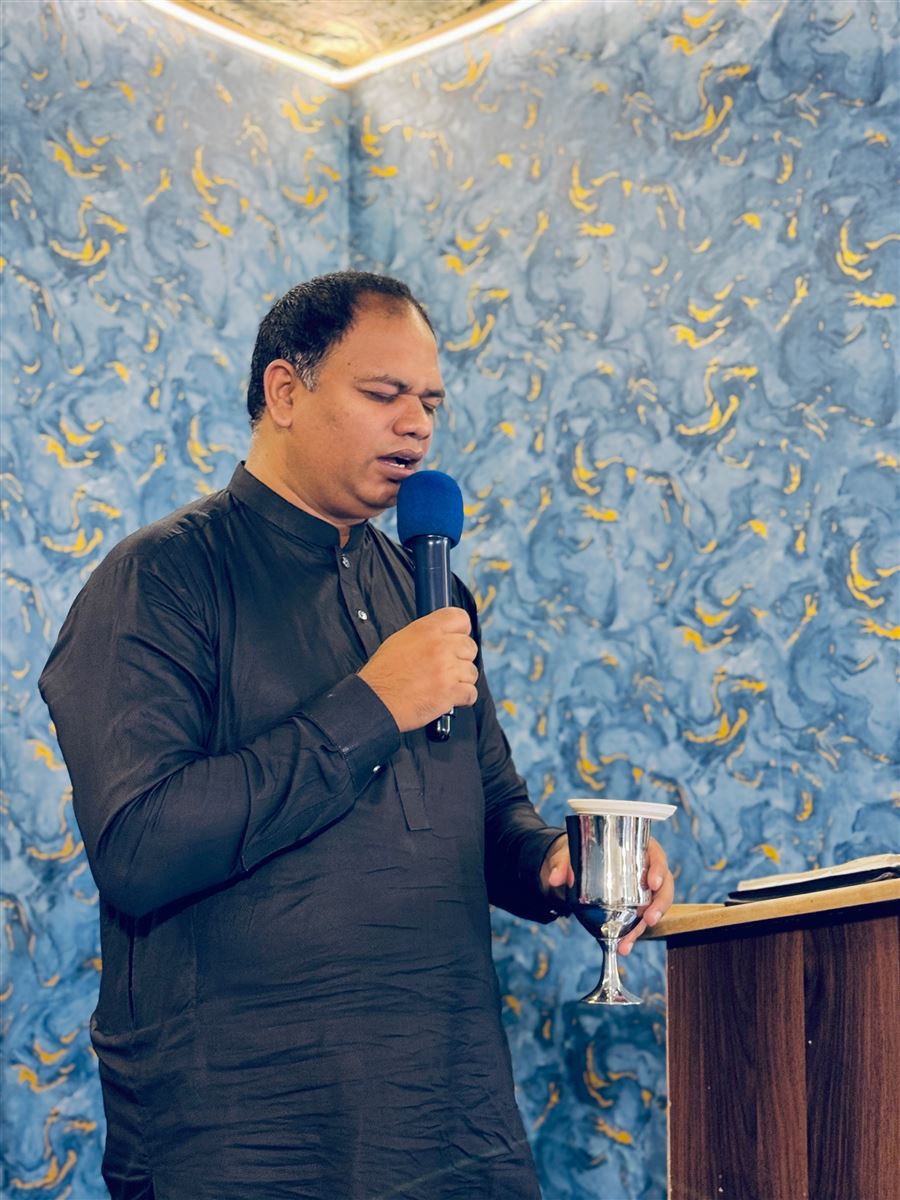 A ministry leader sharing communion