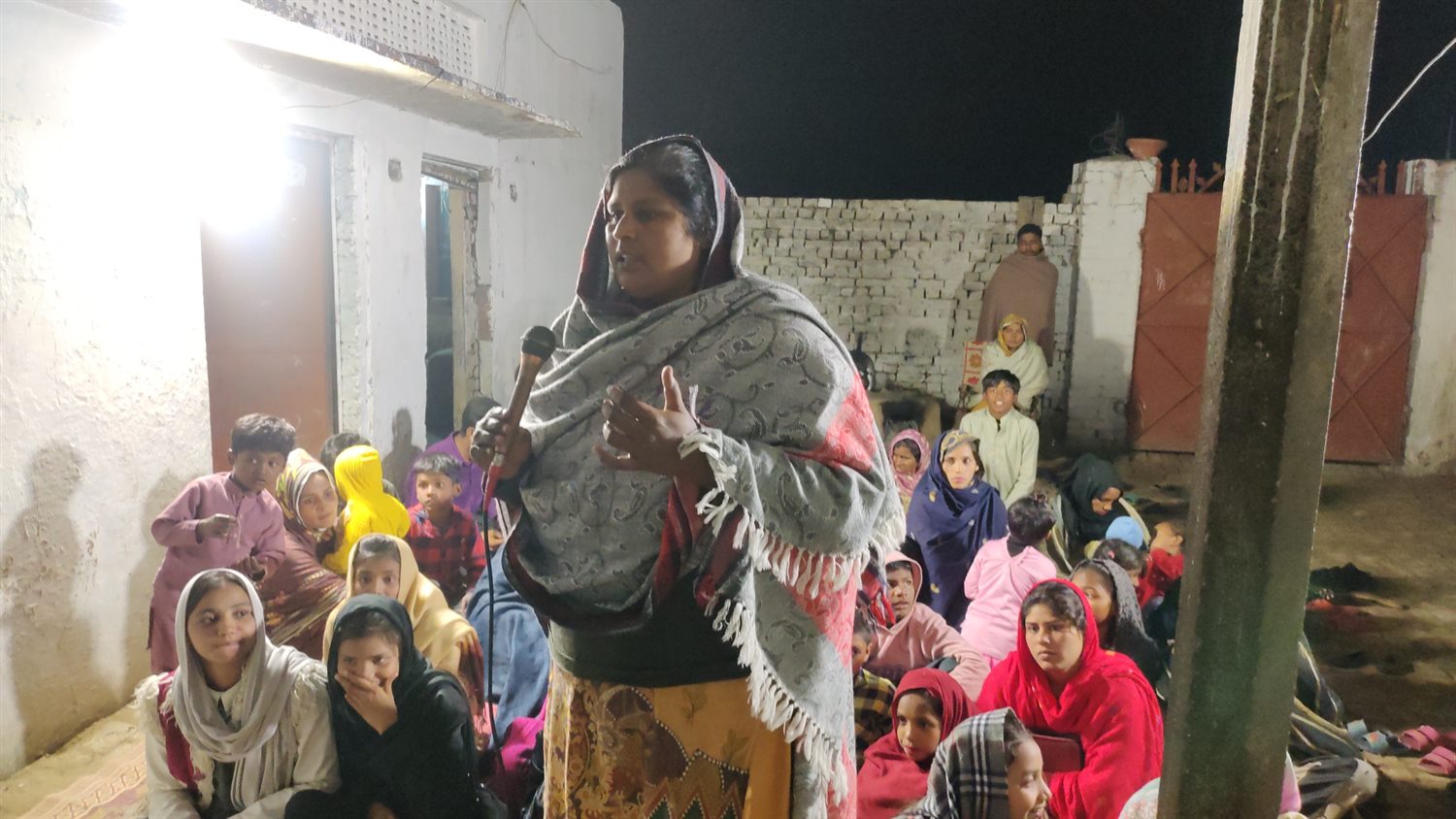 Women and families attending a prayer gathering